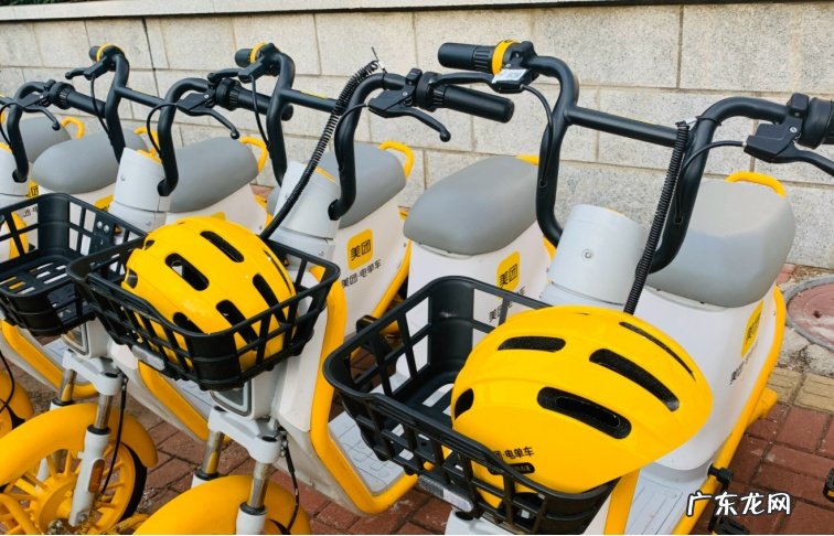 玉林市内美团共享电单车已配备安全头盔