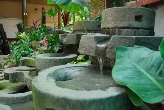 石磨景观造型图片大全 石磨与风水池图片区别