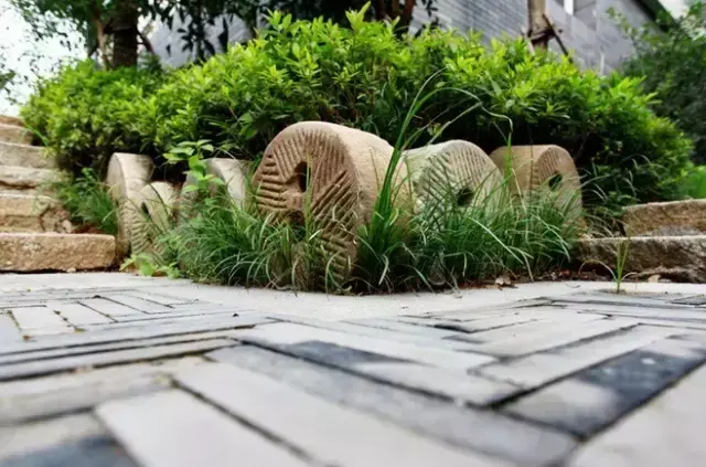 石磨景观造型图片大全 石磨与风水池图片区别