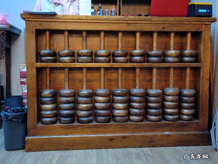 铜算盘的寓意 木算盘还是铜算盘风水好